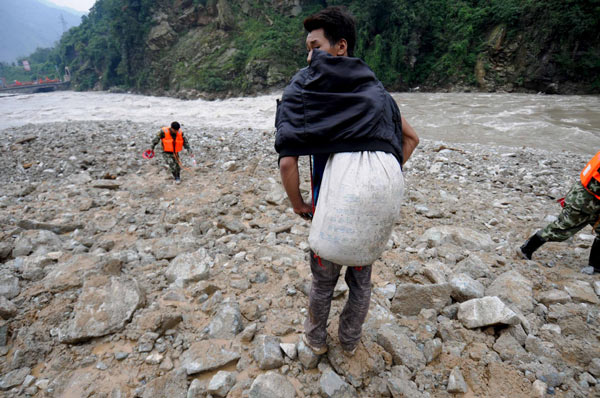 Buried road forces people to climb mountains