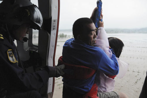 50,000 people evacuated after flood hits NE China