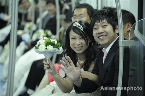 Couples say ‘I do’ in subway wedding