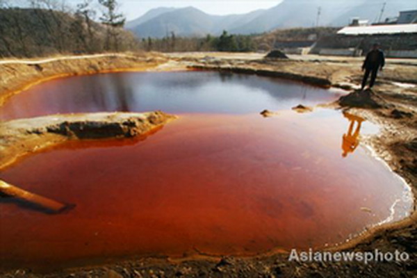 Plant leaves behind polluted farmland