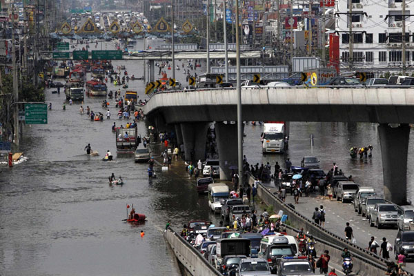 Floodwater forces evacuation in Bangkok's suburb