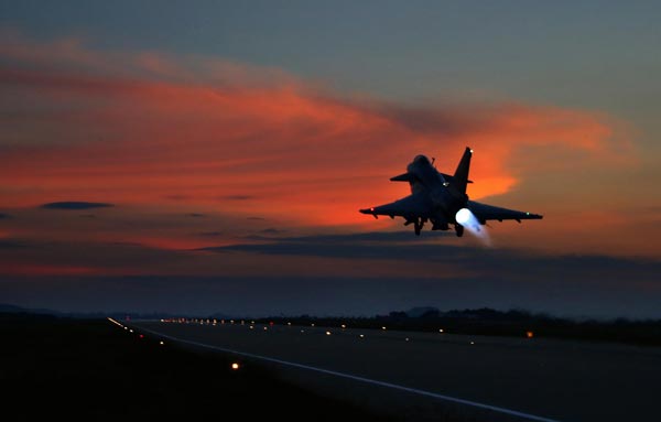 China's J-10 jets practice night flight