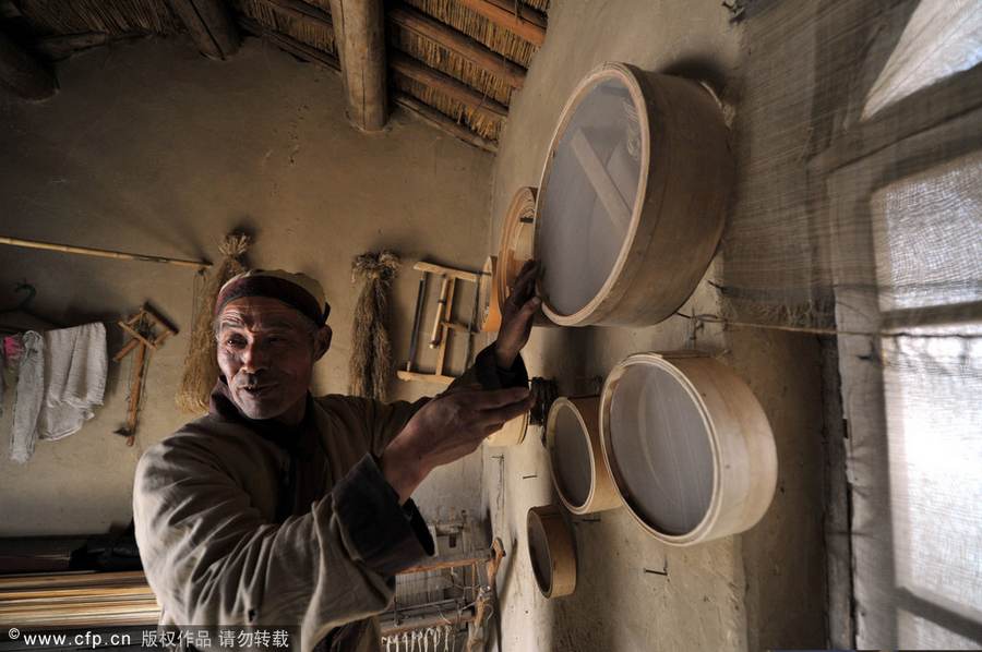 Making flour sifter now a craft of the past