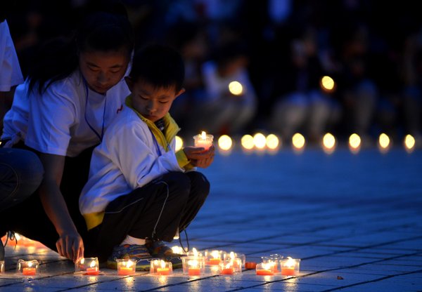 Memory of quake victims honored on 7th day