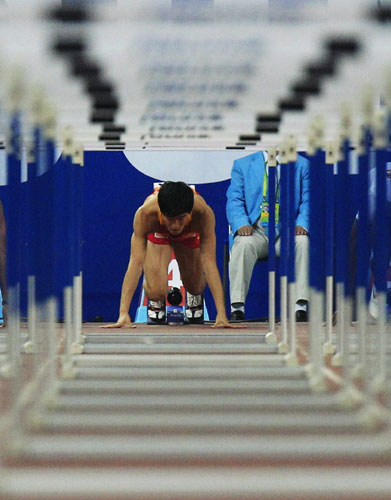 Liu Xiang wins men's 110m hurdles heat