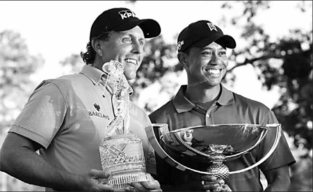 Phil wins but Tiger gets FexEx Cup