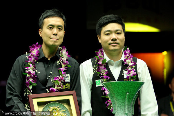 Ding secures third ranking title