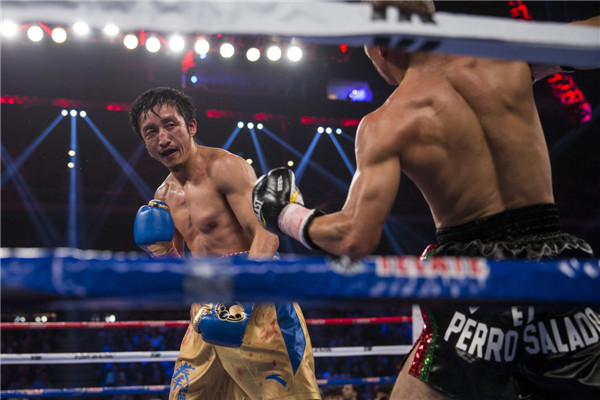 China's Zou Shiming wins third pro bout