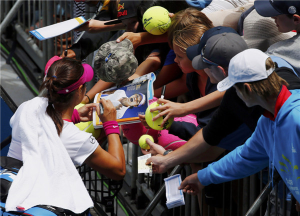 Li Na charges into last eight