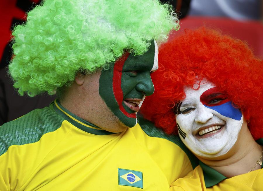 National flags on fan's face