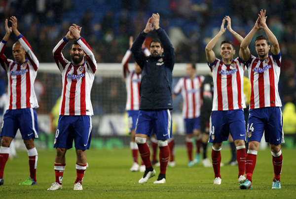 China's Dalian Wanda to buy stake in Spain's Atletico Madrid