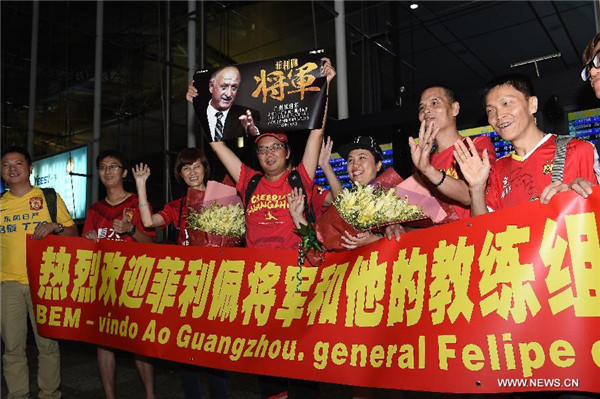 Evergrande's new coach Scolari arrives in Guangzhou