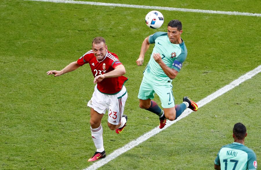 Ronaldo scores twice to help Portugal reach round of 16