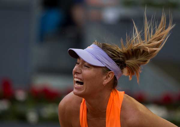 Bouchard eliminates Sharapova at Madrid Open