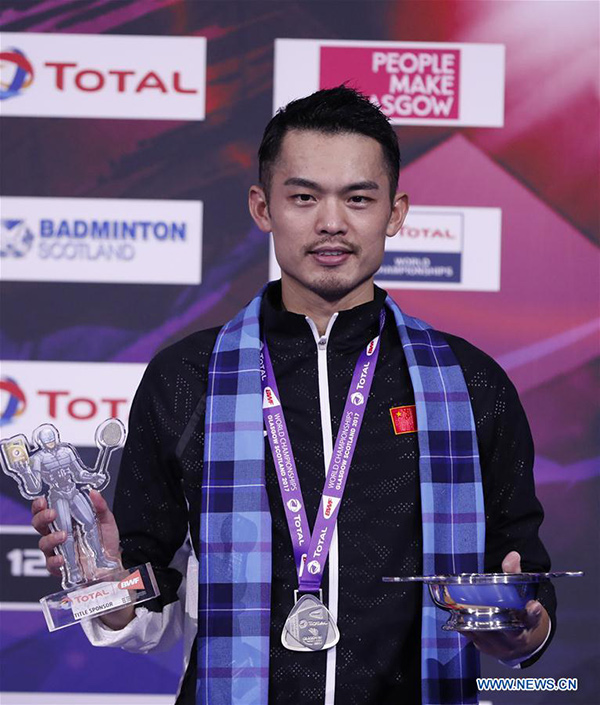 China's Super Dan beaten by Denmark's Axelsen in badminton worlds final