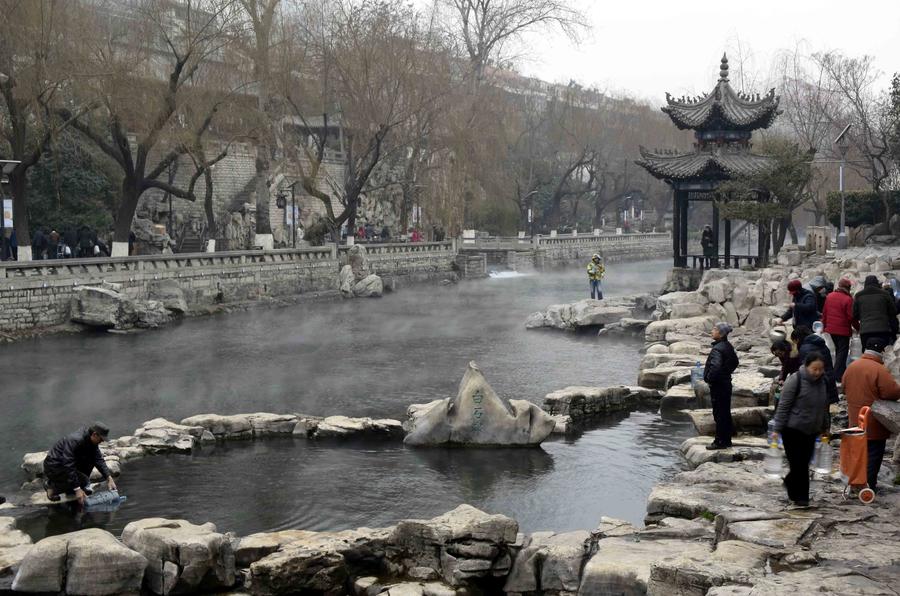 Scenery of mist-enveloped Baishi Spring in Jinan