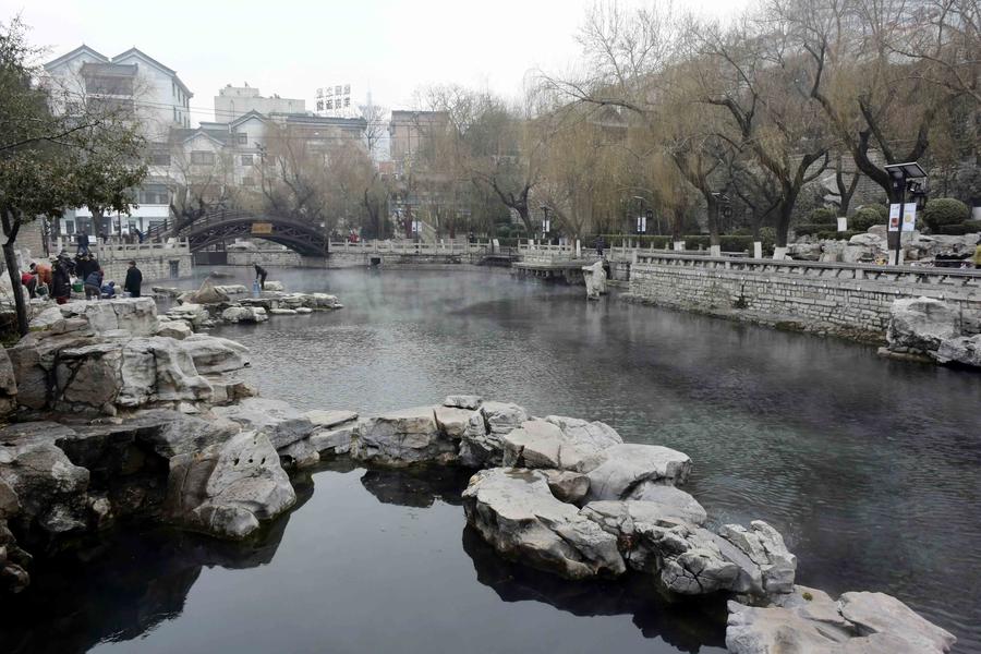 Scenery of mist-enveloped Baishi Spring in Jinan