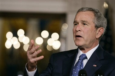 President Bush speaks while making statements to reporters with German Chancellor Angela Merkel, not pictured, in the Cross Hall of the White House in Washington Thursday, Jan. 4, 2007. (AP