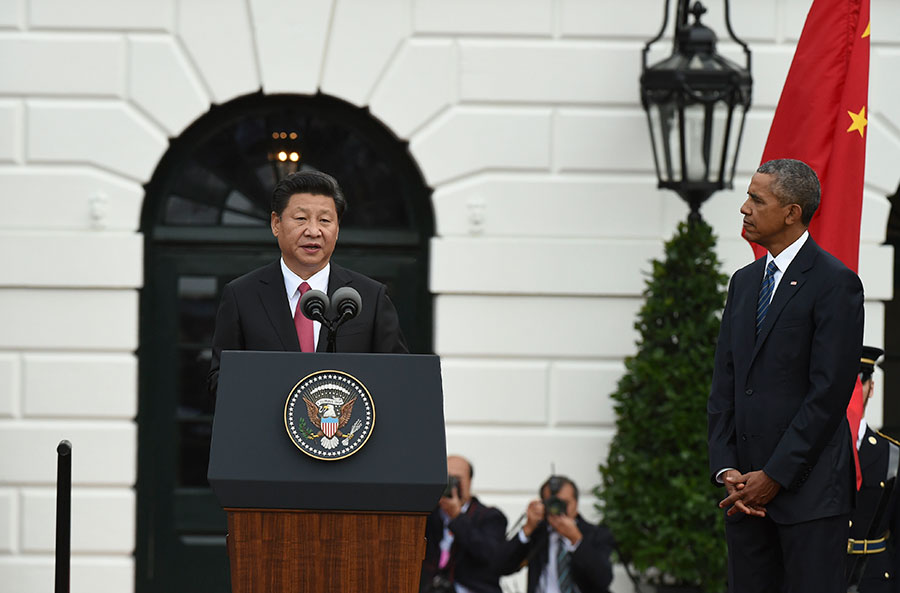 Obama welcomes Xi with <EM>nihao</EM> at elaborate White House ceremony