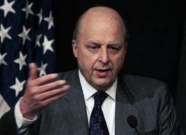 U.S. envoy John Negroponte speaks during a news conference in Islamabad Nov. 18, 2007. Negroponte said on Sunday he has urged Pakistani President Pervez Musharraf to end emergency rule, warning it was 