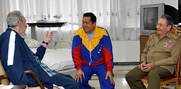 Castros visit Hugo Chavez at Cuban hospital