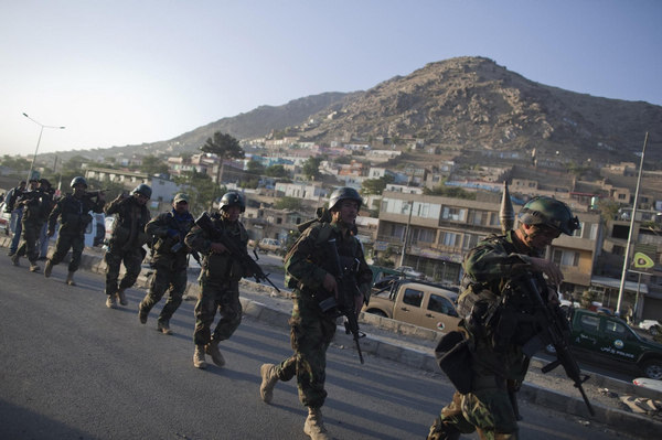 Police search Kabul hotel after Taliban kills 10