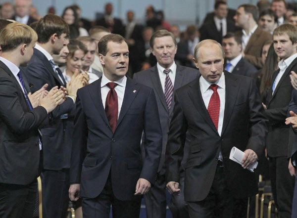 Medvedev succeeds Putin as ruling party leader