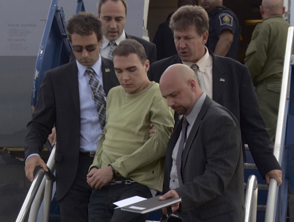 Suspect in cannibalistic murder returns to Canada