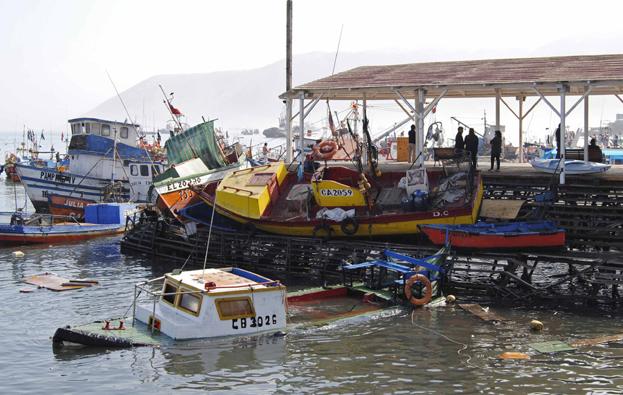 Chile assesses damage after massive quake, tsunami