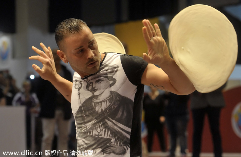 Bakers perform with dough in Pizza World Championships