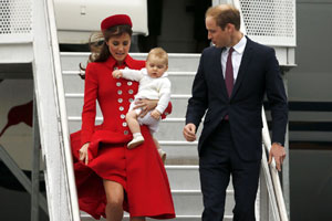 Prince William and his wife Kate unveil portrait of Queen Elizabeth