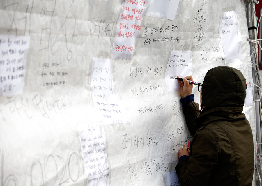 Death toll surges to 56 as divers enter sunken S.Korean ferry