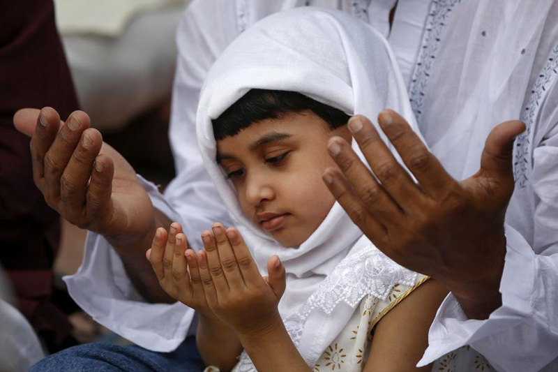 Muslims around the world celebrate Eid al-Fitr