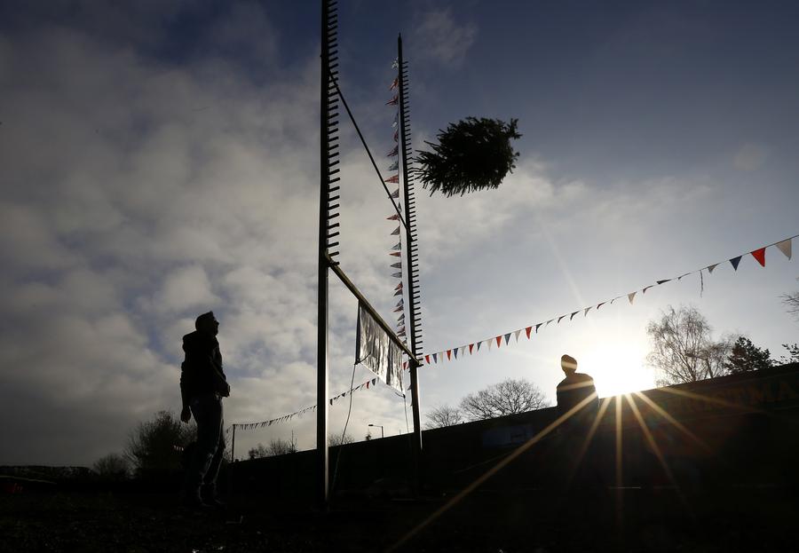 Christmas Tree Throwing Championships held in UK