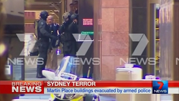 Live: Hostages held in Sydney cafe