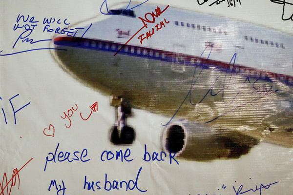 MH370 families remember one year on