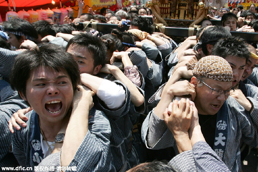 Portable shrines paraded through Tokyo to celebrate Kanda Festival