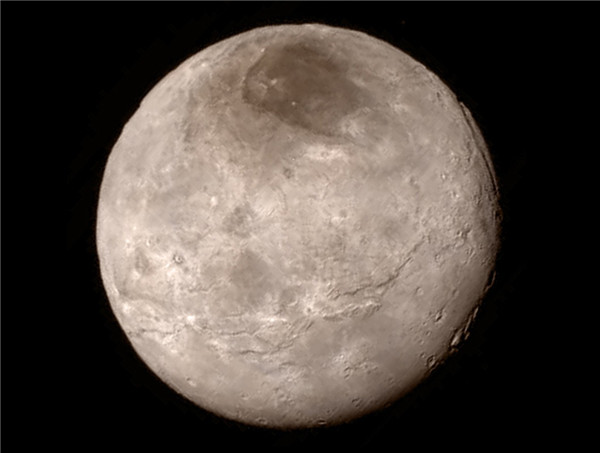 Tiny Pluto sports big mountains, New Horizons finds