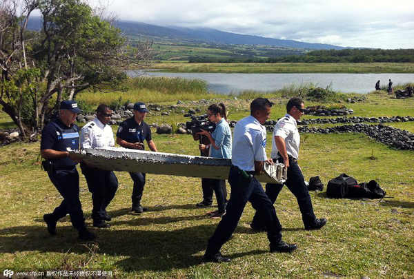 Malaysian, French investigators meet to coordinate probe on suspected MH370 wreckage