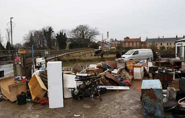 Storm Frank batters northern Britain, experts see costs rising